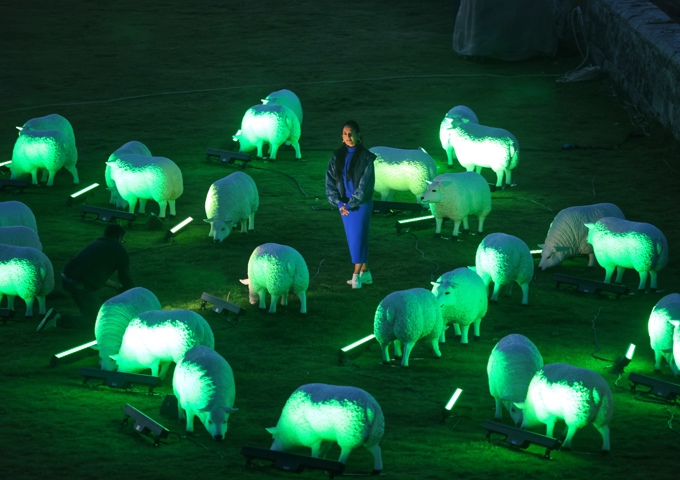 4. Flock Of Illuminated Sheep With Artist Deepa Mann Kler At Bamburgh Castle Overlooking Lindisfarne